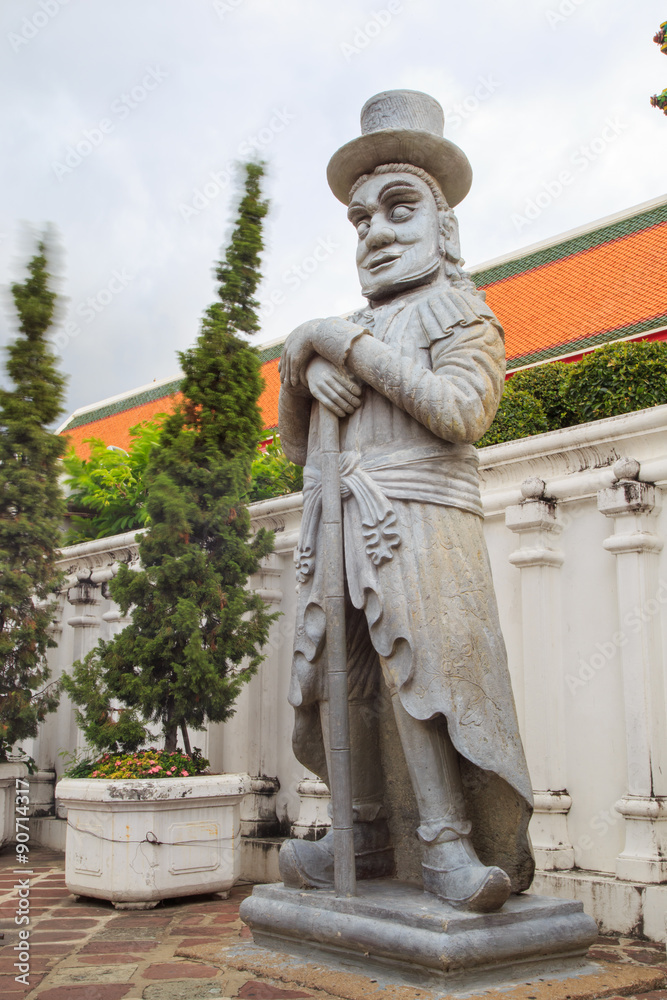 Obraz premium European giant statue at Wat Pho temple, Bangkok, Thailand