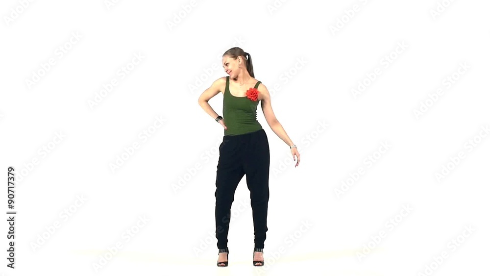 Beautiful latina dancer in action, on white, slow motion Beautiful latina dancer in action, on white, slow motion