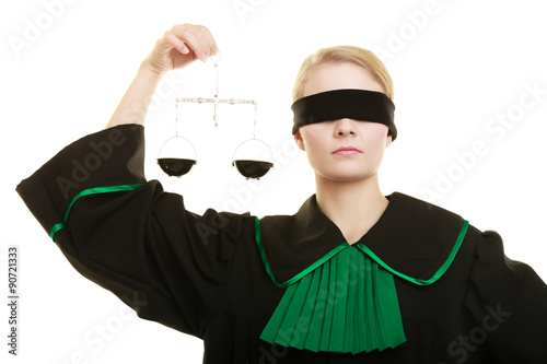 woman barrister holding scales.