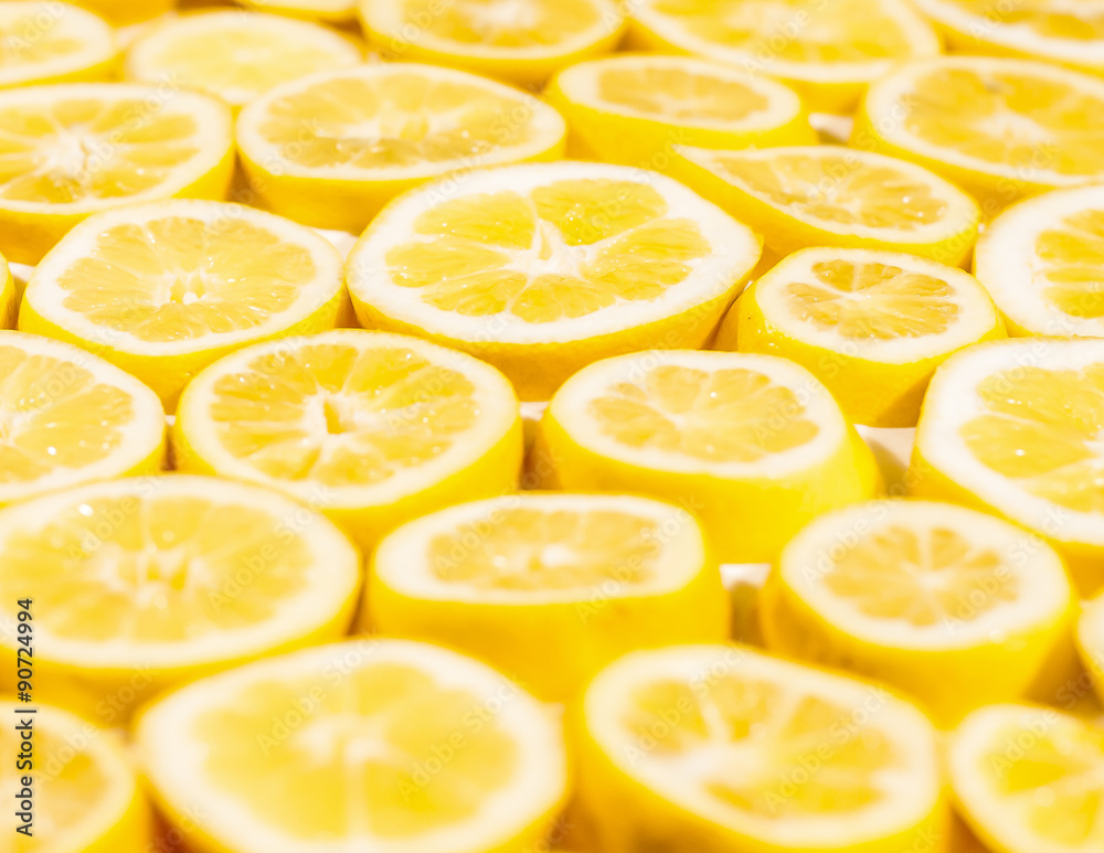 Full frame of bright yellow lemon slices