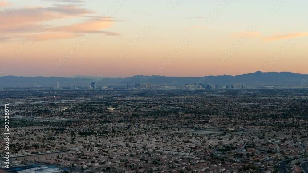 Las Vegas dusk to night cityscape mountaintop time lapse with zoom in. Las Vegas dusk to night cityscape mountaintop time lapse with zoom in.