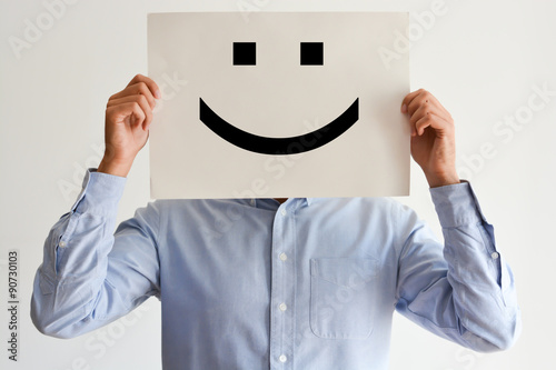 Career happiness with employee holding a blank paper and a smiley photo