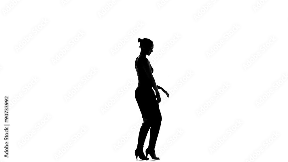 Beautiful latin dancer in action, on white, slow motion Beautiful latin dancer in action, on white, slow motion