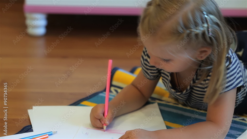 Little girl drawing with pencils Little girl drawing with pencils