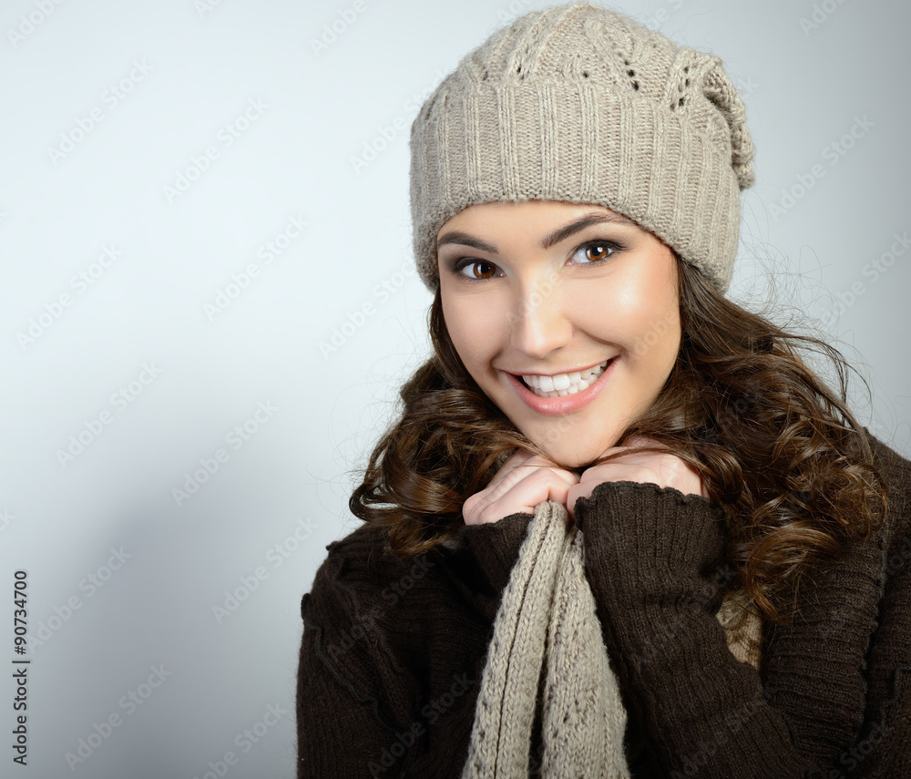 Cheerful attractive young girl smiling and looking at camera, in Cheerful attractive young girl smiling and looking at camera, in