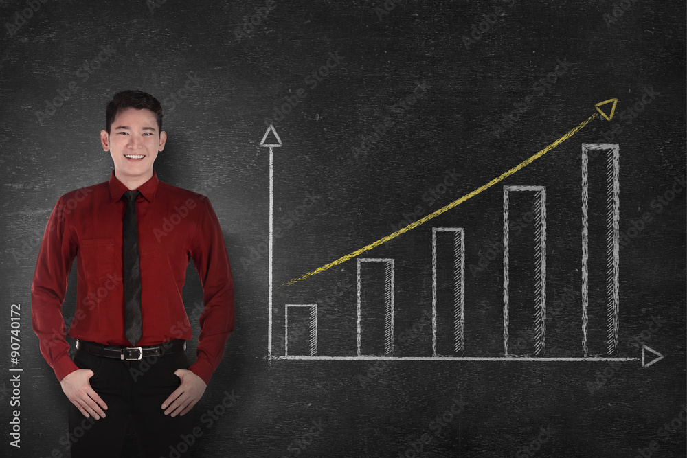 Confident asian business man smile with chalk board graph Confident asian business man smile with chalk board graph