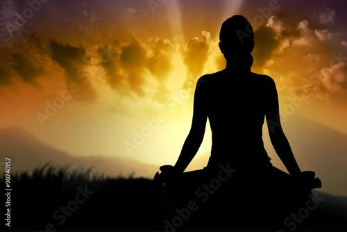 Silhouette of asian woman doing yoga