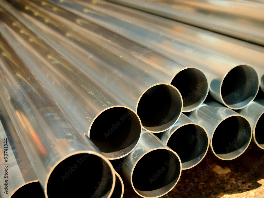 Stack of Many Pipes at the Construction Site Stack of Many Pipes at the Construction Site