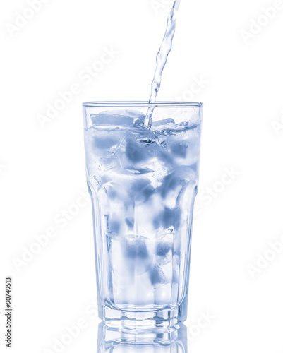 Glass of pure water with ice cubes. Isolated on white