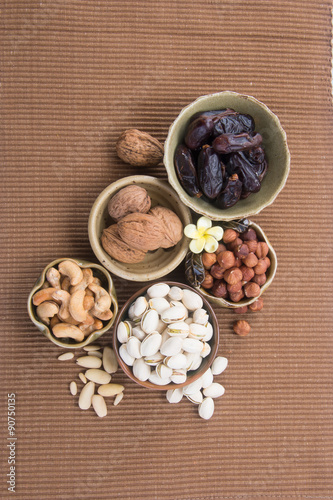 Fototapeta Naklejka Na Ścianę i Meble -  nuts. mixed nuts on the background