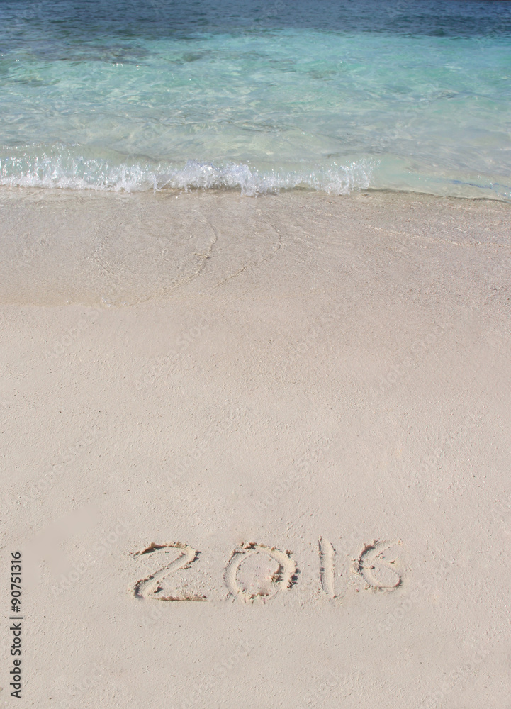 Handwriting inscription 2016 on the beach Handwriting inscription 2016 on the beach