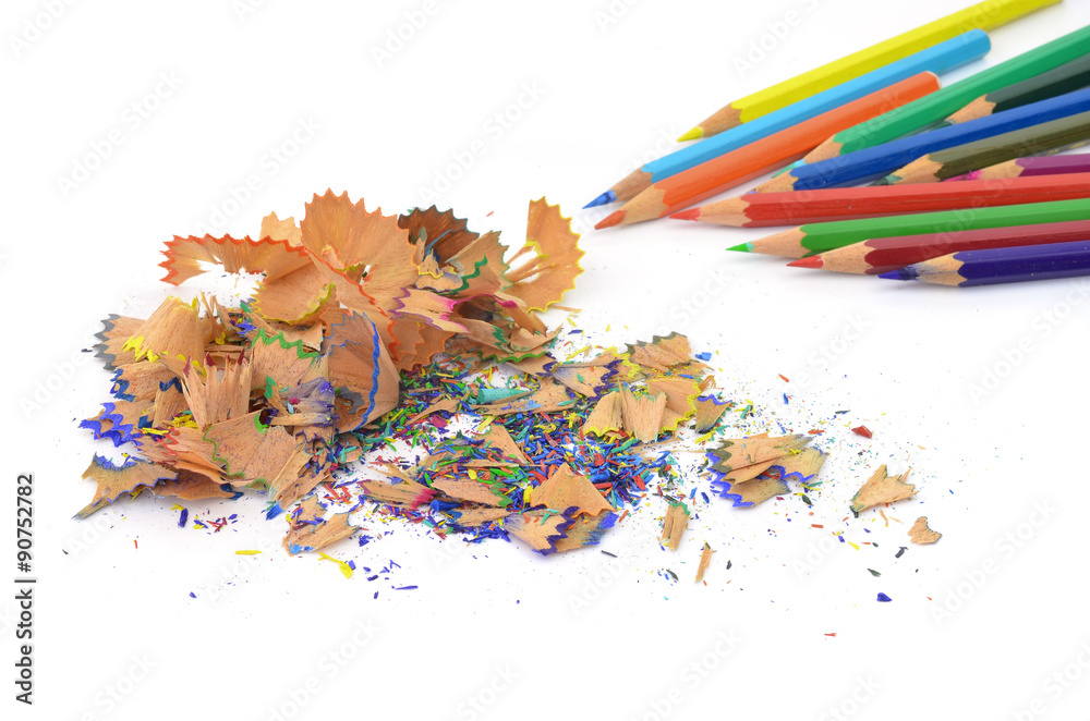 Shavings from multicolored pencils on white background Shavings from multicolored pencils on white background