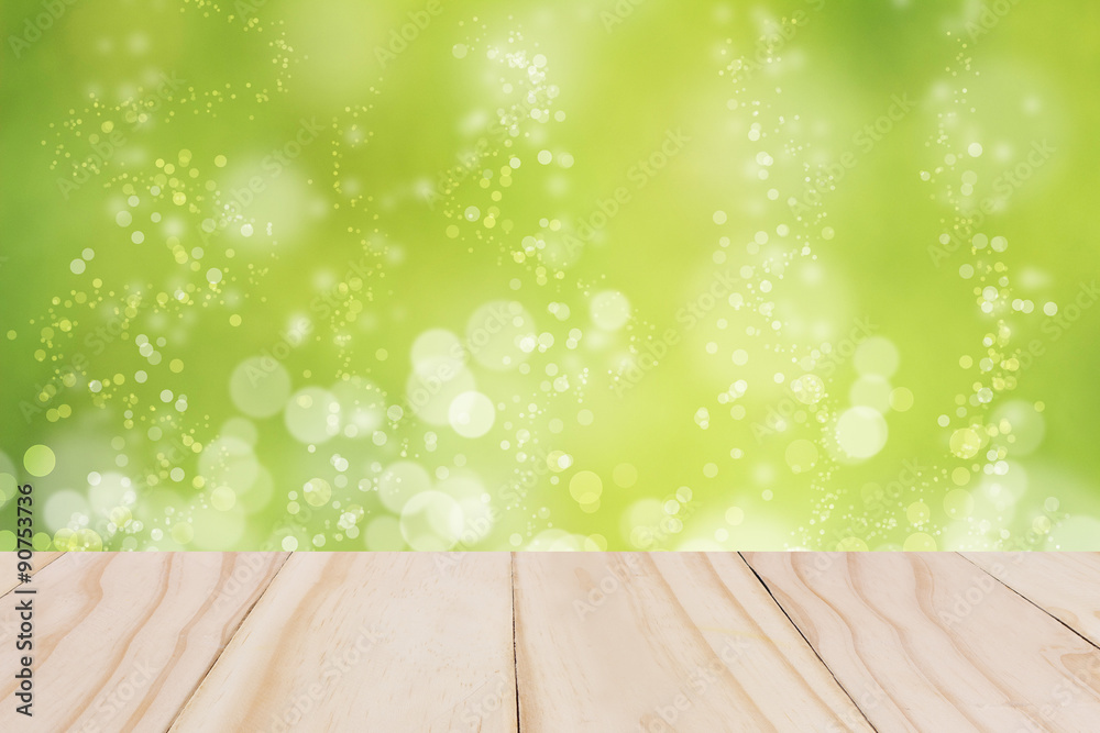 Wooden table with green bokeh Wooden table with green bokeh