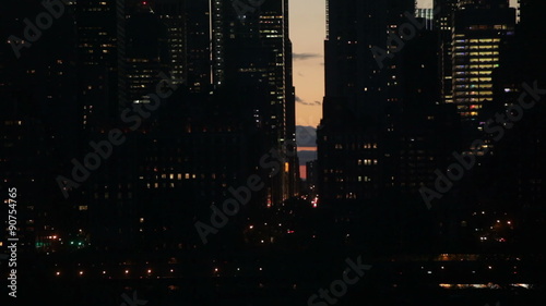 Fast motion night scene of FDR drive and East 57th Street in Midtown Manhattan, New York City, USA.