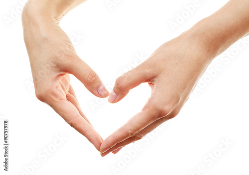 Female hands in form of heart isolated on white