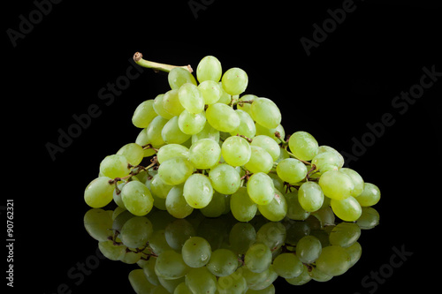 White grapes on a black background