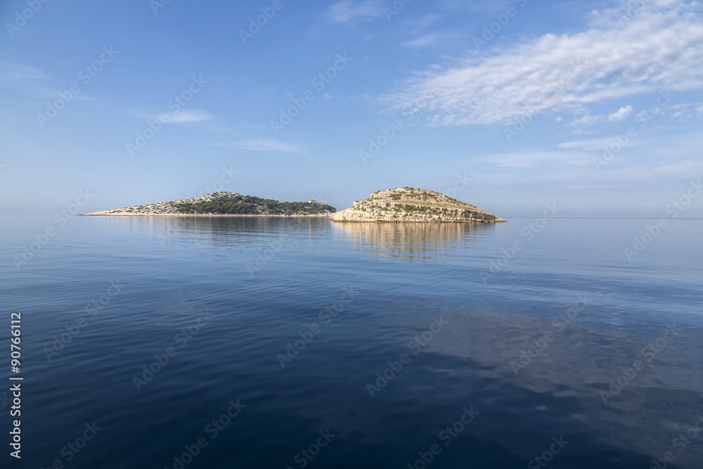 Island with lighthouse in National Park Kornati, Croatia.