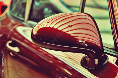 Mirror of the original cherry-old car. Retro style. Sophisticati