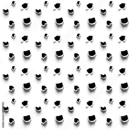 Holes in the paper seamless background.