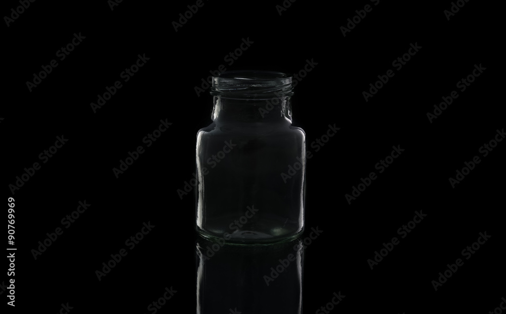 Glass jar with empty threaded