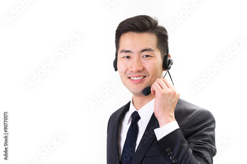 Businessman talking using headset, white background