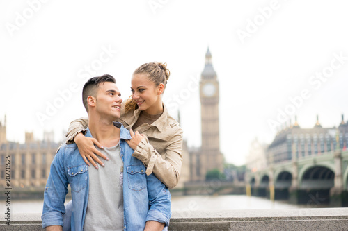 Tourist Couple taking selfie at Big Ben, London photo