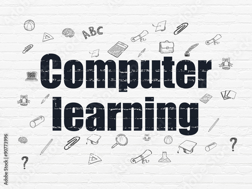 Education concept  Computer Learning on wall background