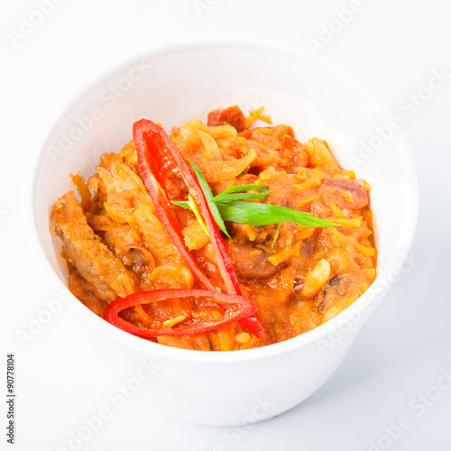 Chili con carne in white plastic plate isolated