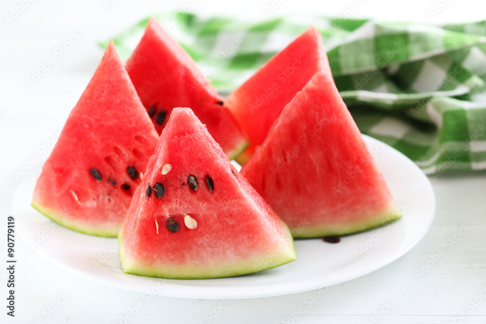 Tasty slice of watermelon on white wooden background Tasty slice of watermelon on white wooden background