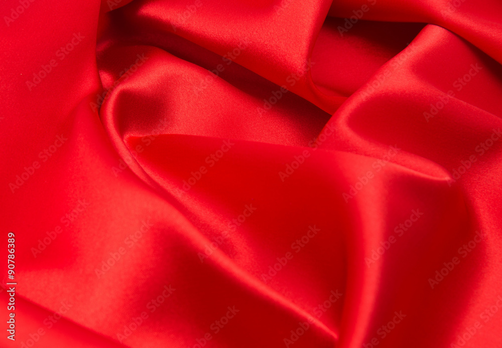 red satin or silk fabric as background
