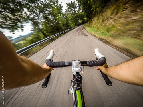 Going Down with Bicycle on the Road. pov, original point of view