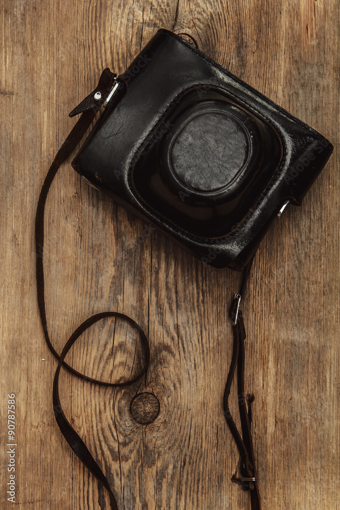 Retro camera in leather case Retro camera in leather case