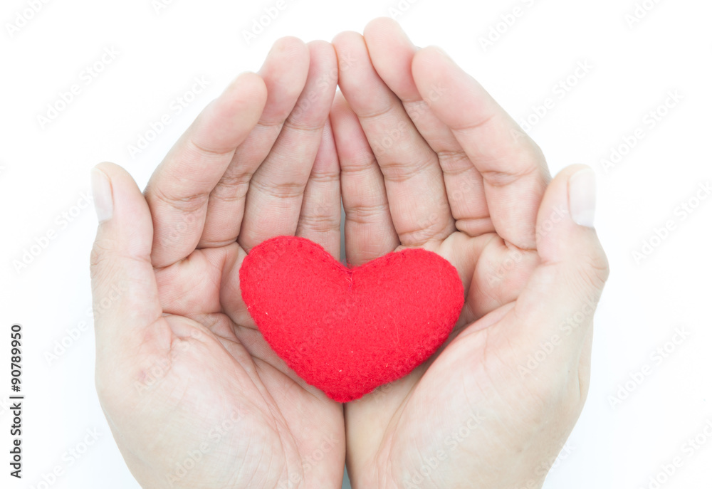 decorative red heart in human hands