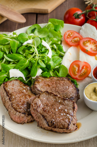 Beef steak with salad