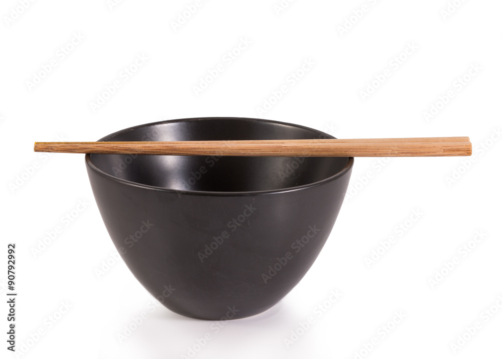 bamboo chopstocks on black bowl bamboo chopstocks on black bowl