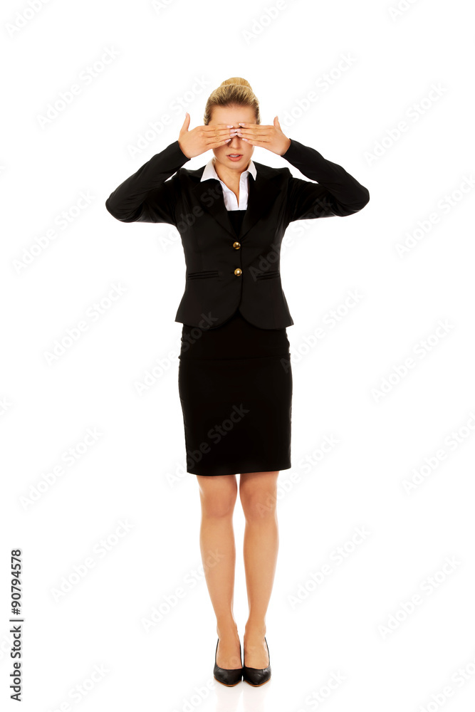 Beautiful woman covering her eyes with her hands. Beautiful woman covering her eyes with her hands.