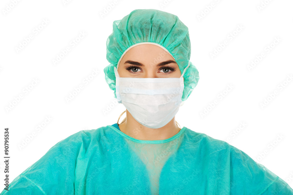 Female surgeon doctor in protective mask Female surgeon doctor in protective mask