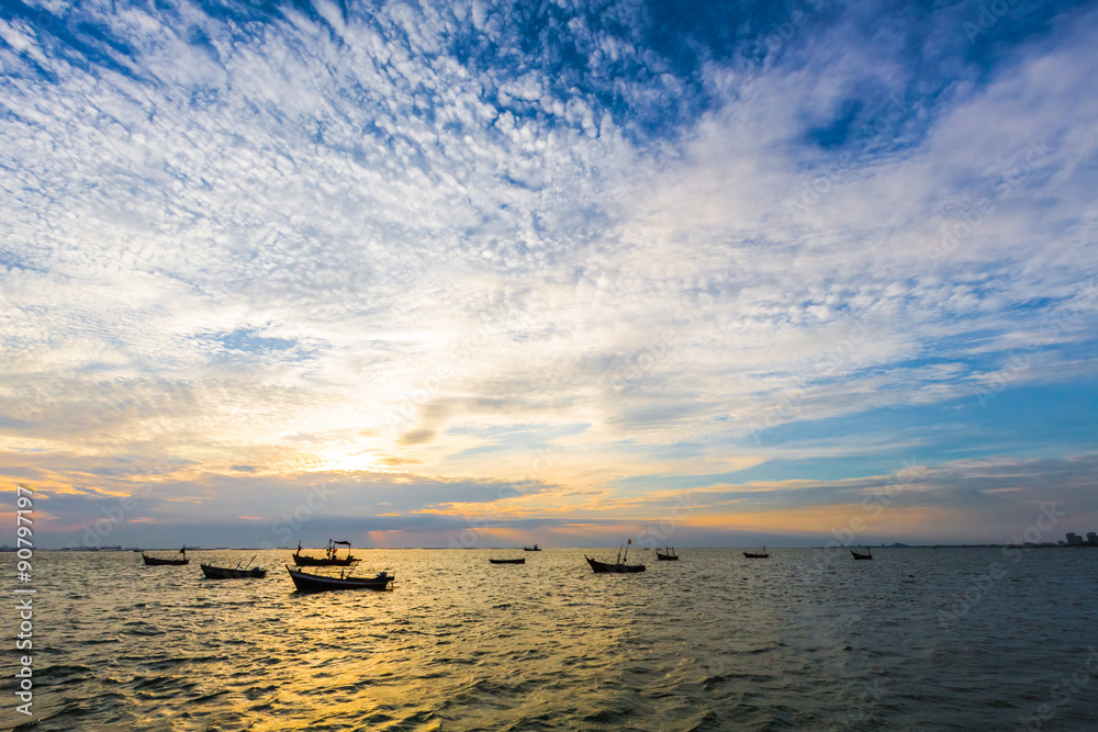 Small fishing boats in the sea.