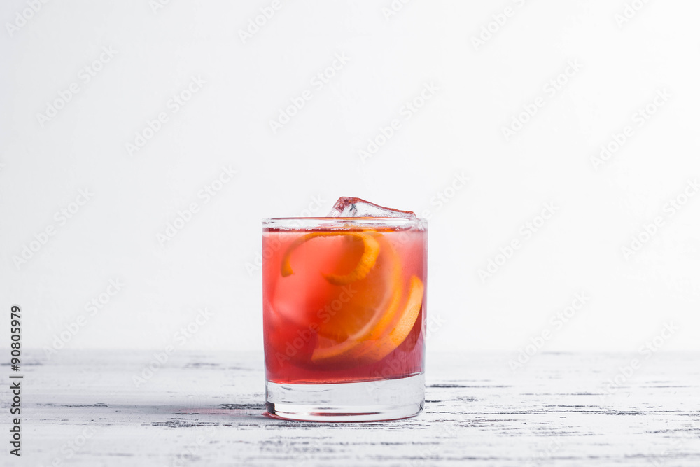 Old fashioned cocktail on the wooden background Old fashioned cocktail on the wooden background