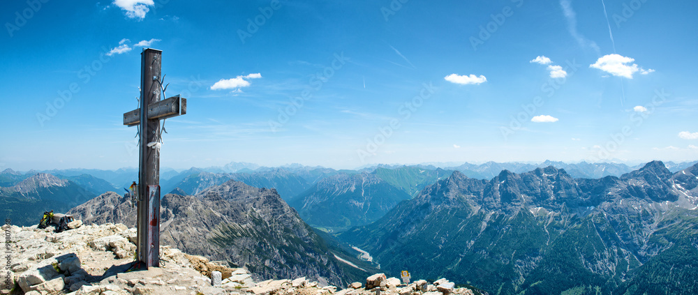 Summit Cross on Mountain Peek in Allgau Alps