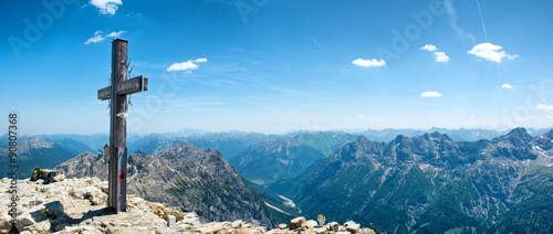 Summit Cross on Mountain Peek in Allgau Alps