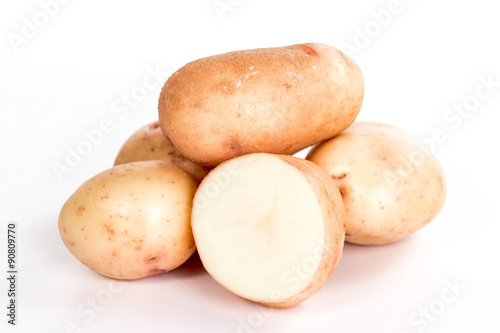 pile of pure potato with half isolated on white background