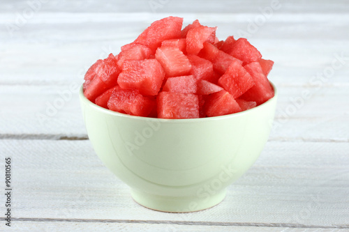 watermelon in a bowl on a wooden background
