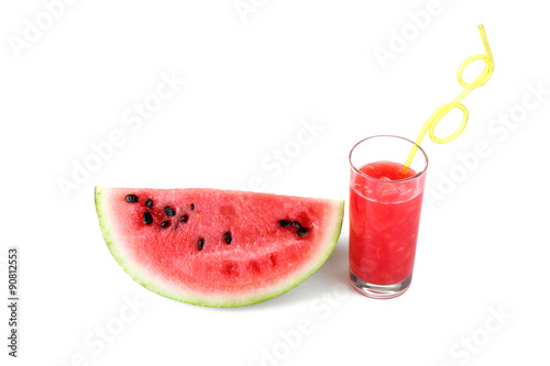 sliced watermelon and juice on a white background