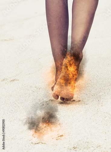 Woman with her feet aflame and scorch marks