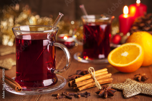 Mulled wine or glühwein on a rustic table photo