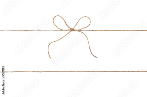 Rope and bow isolated on white