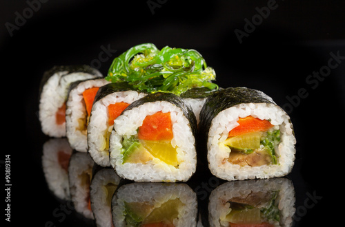 Maki sushi served on black background #90819314