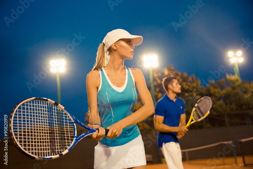 Wallpaper Mural Man and woman playing tennis Torontodigital.ca
