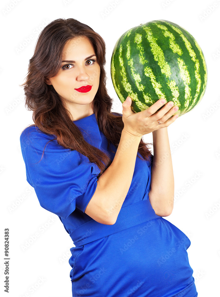 Beautiful attractive girl holding heavy watermelon. Beautiful yo Beautiful attractive girl holding heavy watermelon. Beautiful yo